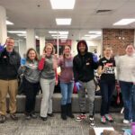 Staff Senate volunteers help with distribution of donated items
